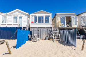 Slaapstrandhuisje bij Dishoek direct aan zee met panoramisch uit