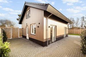 Huis Zand | Julianadorp aan Zee | Omheinde tuin