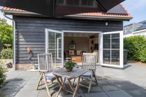 Holidayhome - Sloestraat 38 | Zoutelande 'Het Koetshuys'