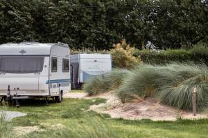 Duinenplaats met water