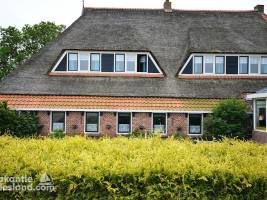 Vakantieboerderij Holwerd met bar