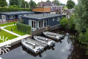 Vakantiehuis voor 4 pers. inclusief boot, aan de rivier de Tjong