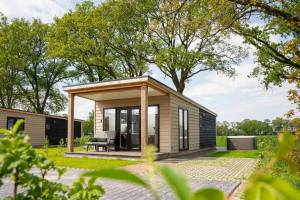 Luxe 2 persoons wellnesslodge met bubbelbad, sauna en sunshower