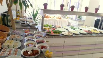 Kamer Suites & Hotel