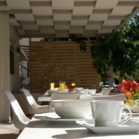 Grand TheoNi Hotel Suites & Spa